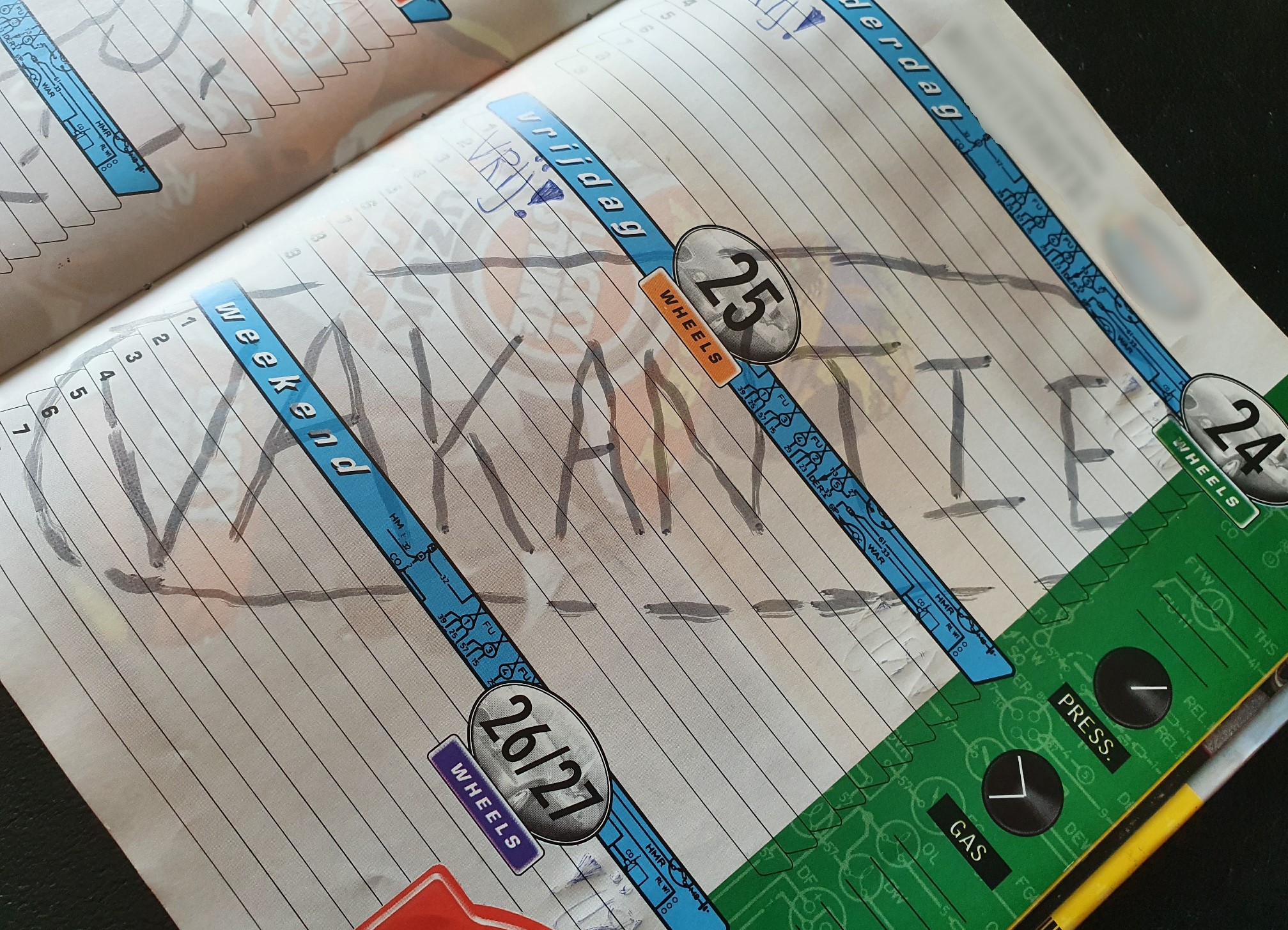 Diary in which the word 'holiday' is written in Dutch