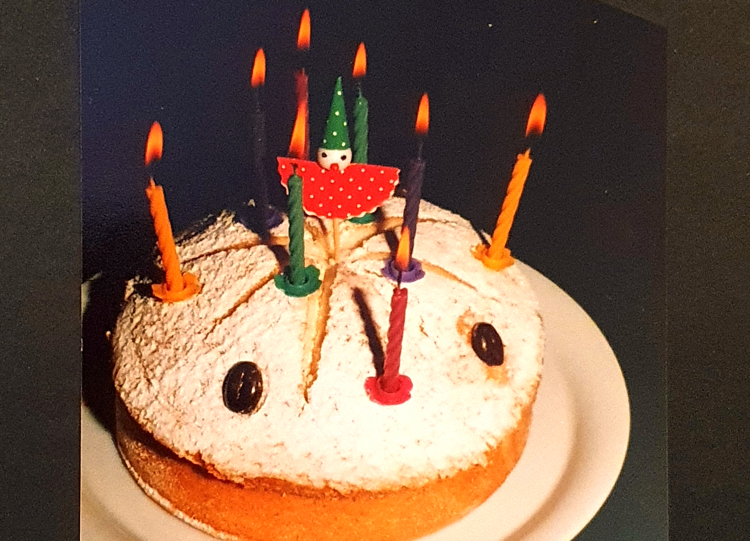 Birthday cake with burning candles
